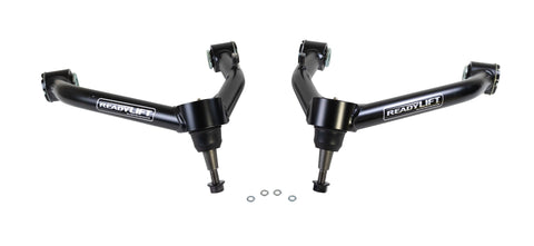 ReadyLIFT SST UCA, full kit on a studio background: A pair of black ReadyLIFT upper control arms with ball joints and washers on white