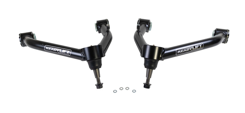 ReadyLIFT SST UCA, full kit on a studio background: A pair of black ReadyLIFT upper control arms with ball joints and washers on white
