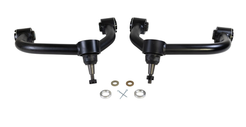 ReadyLIFT SST UCA, full kit on a studio background: A pair of black upper control arms with ball joints and washers on a white background