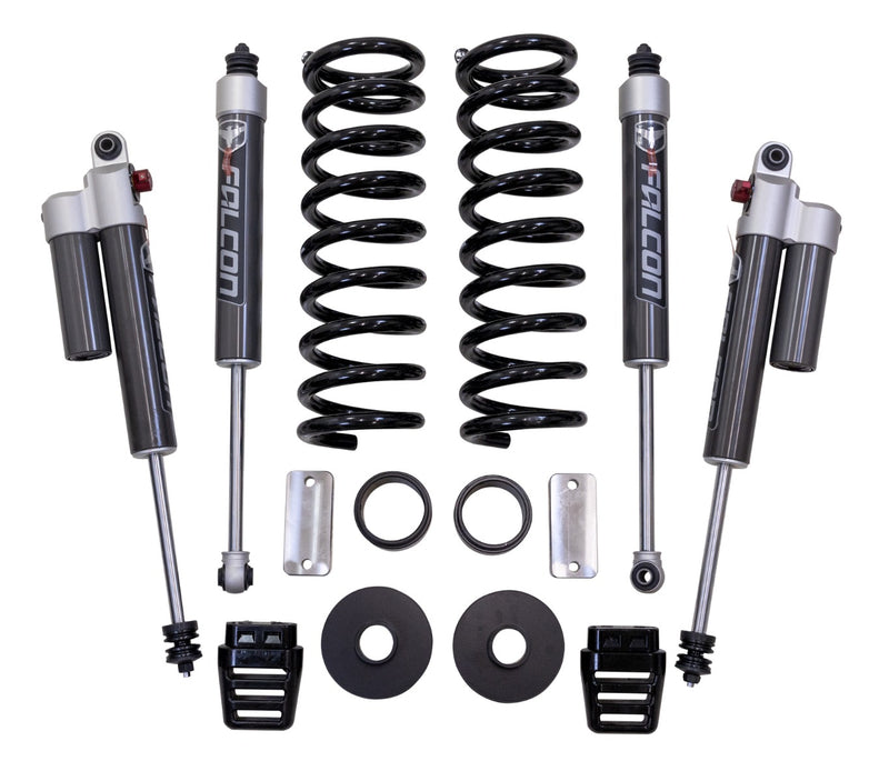 ReadyLIFT SST2.1 Coil Spring Lift Kit, full kit on a studio background: two black coil springs, four Falcon shocks with reservoirs, spacers, brackets and bump stops on white