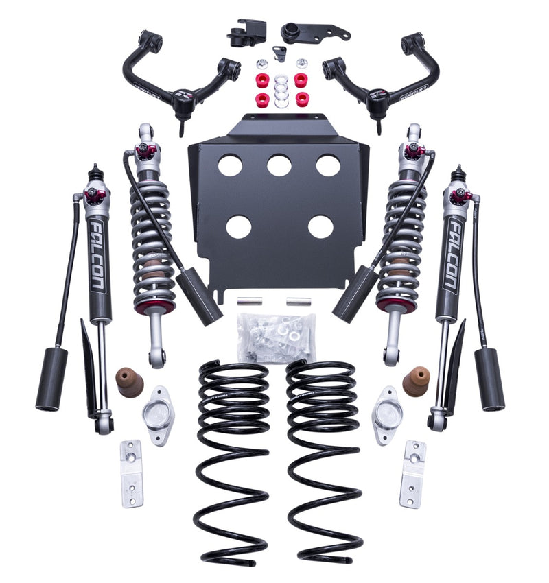 ReadyLIFT SST3.3 Suspension System, full kit on a studio background: two upper control arms, two Falcon coilovers, two Falcon rear shocks, rear springs and a skid plate on white