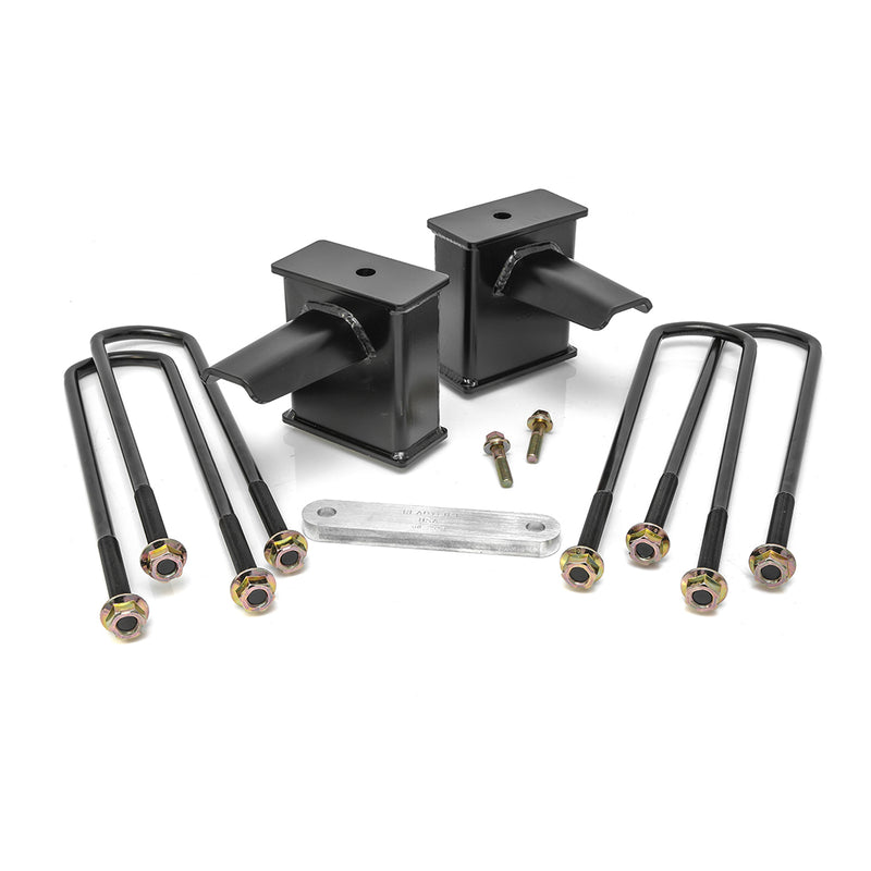 ReadyLIFT Tall Tapered Block, full kit on a studio background: two tall black tapered rear blocks with U-bolts, bolts and an aluminum plate on white