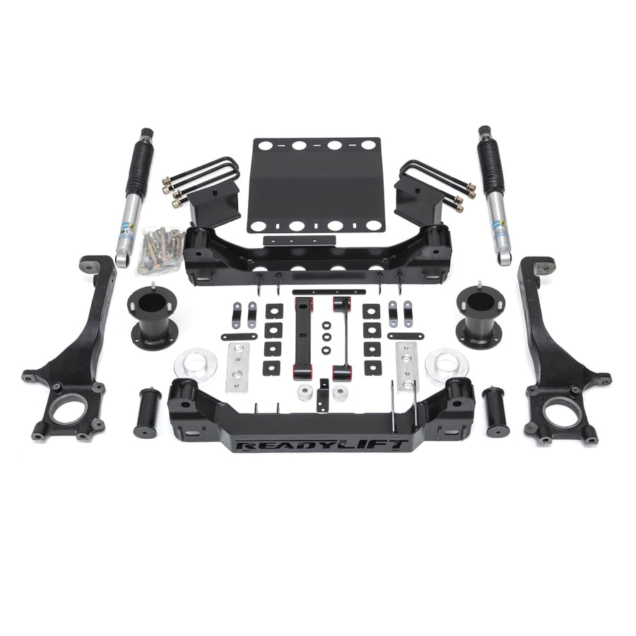 Big Lift Kits by ReadyLIFT: ReadyLIFT 6" Tacoma kit with knuckles, crossmembers, skid plate, spacers, blocks, U-bolts and Bilstein shocks on white.