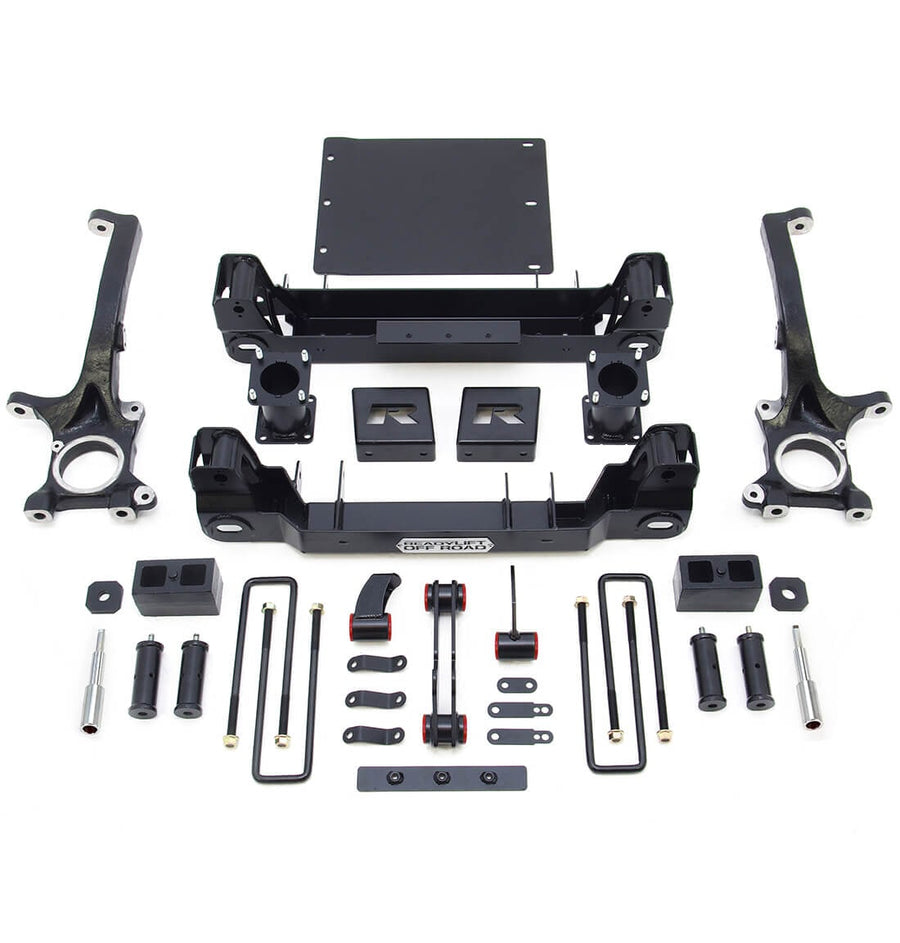 Big Lift Kits by ReadyLIFT: ReadyLIFT Tundra kit with knuckles, crossmembers, skid plate, blocks, U-bolts and hardware on white.