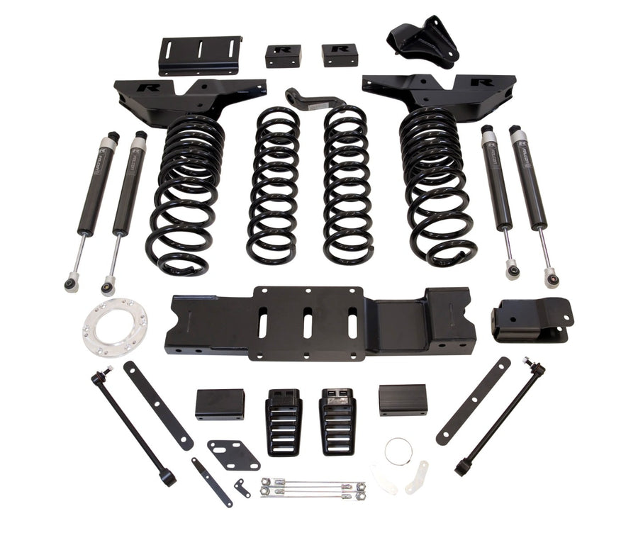 Big Lift Kits by ReadyLIFT: ReadyLIFT Ram 2500 kit with crossmember, radius arm brackets, coil springs, Falcon shocks, blocks and links on white.