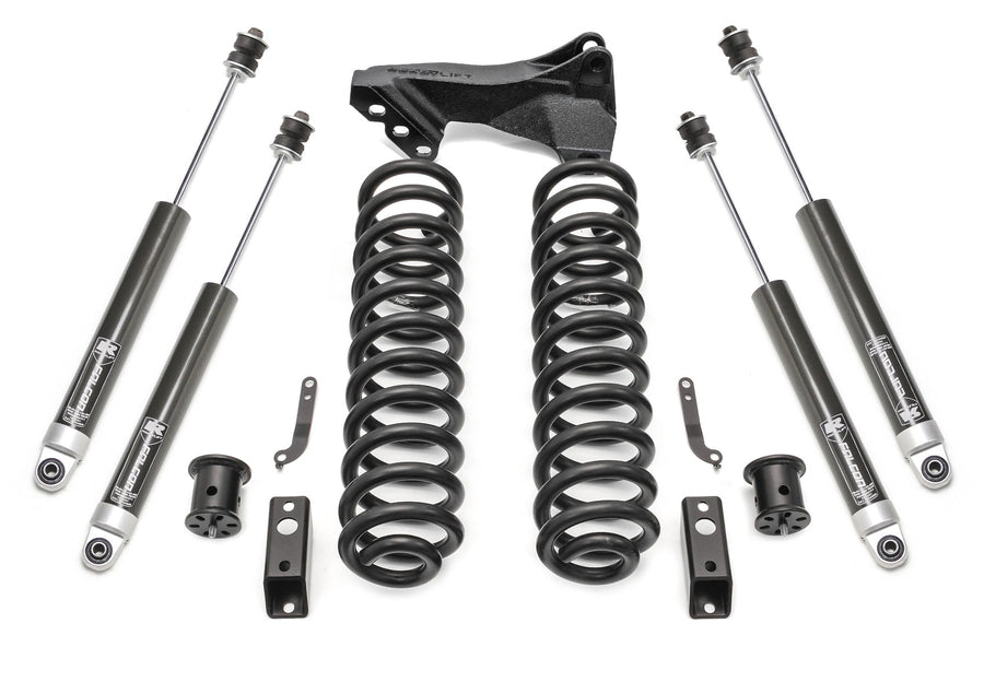 Leveling Kits by ReadyLIFT: Coil springs with track bar bracket, four gray Falcon shocks and hardware on white.