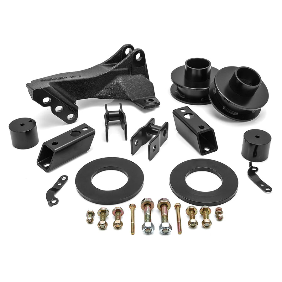 Leveling Kits by ReadyLIFT: Black coil spacers, rings, track bar bracket, shock extensions and bolts on white.