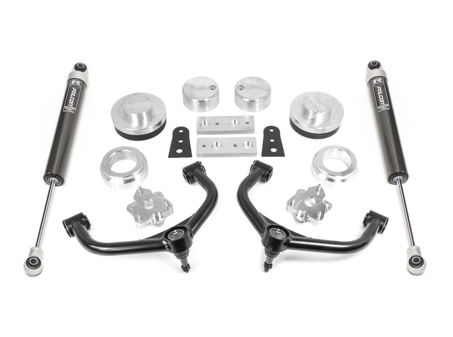 SST Lift Kits by ReadyLIFT: Aluminum spacers, black upper control arms, brackets and two black Falcon monotube rear shocks on white.