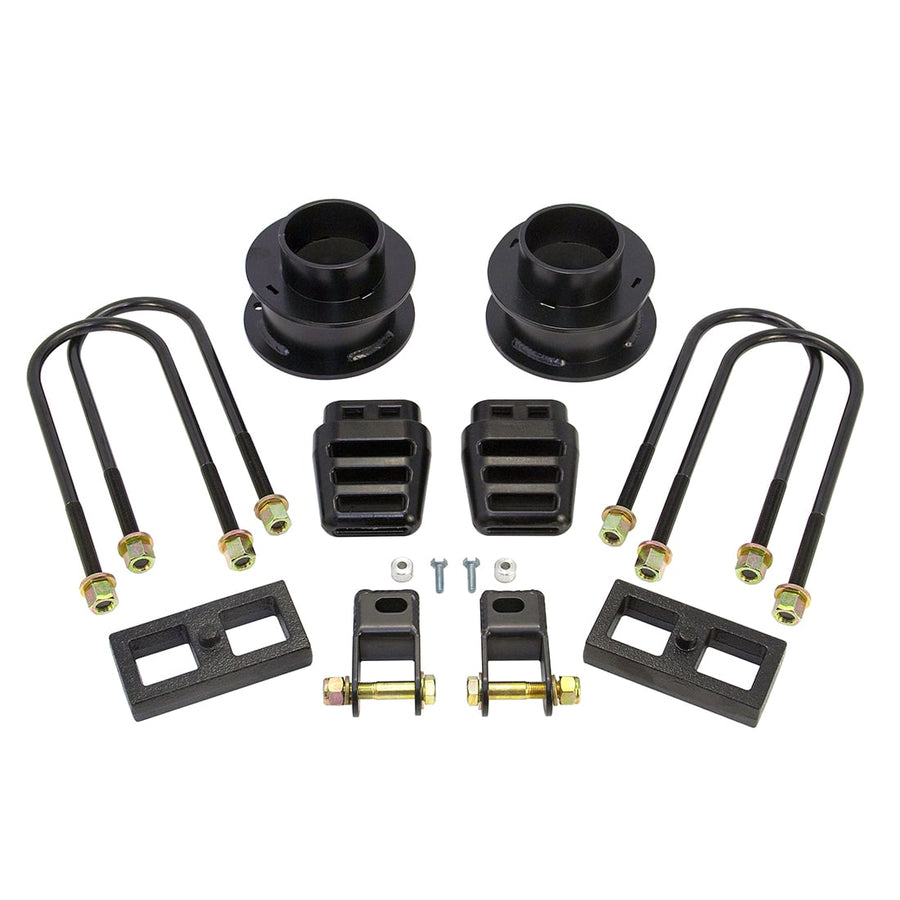 SST Lift Kits by ReadyLIFT: Front coil spacers, bump stops, U-bolts, two rear blocks, shackle brackets and hardware on white.