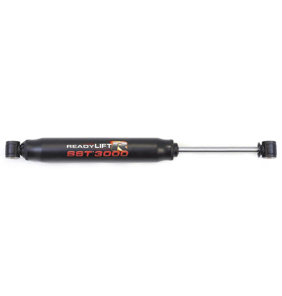SST3000 Shocks by ReadyLIFT: A single black ReadyLIFT SST3000 shock absorber on white.