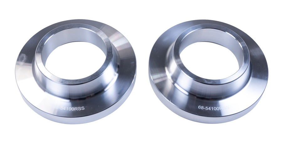 Rear Spacer Kits by ReadyLIFT: Two machined aluminum 1" rear coil spacers side by side on white.