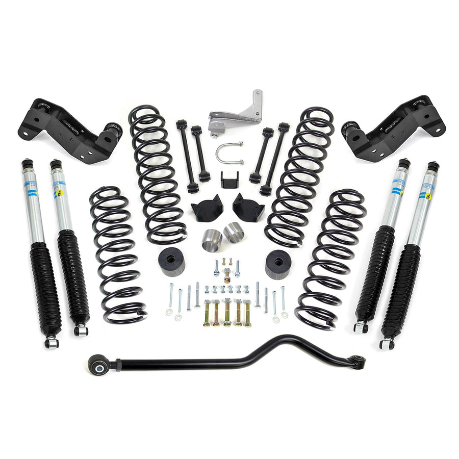 SST Lift Kits by ReadyLIFT: Four coil springs, four Bilstein shocks, an adjustable track bar, brackets and hardware on white.