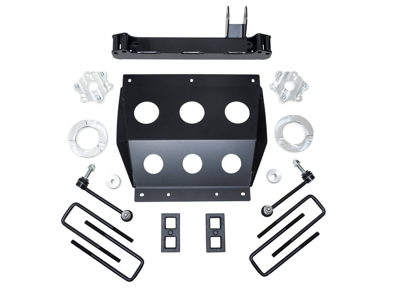 ReadyLIFT lift kit: a black skid plate, crossmember brace, aluminum spacers, sway bar links, rear blocks and U-bolts on white