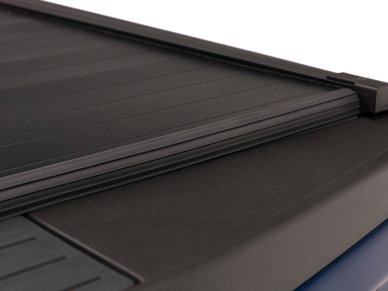 Close-up of the closed Retrax IX slats meeting the side rail and tailgate-end seal
