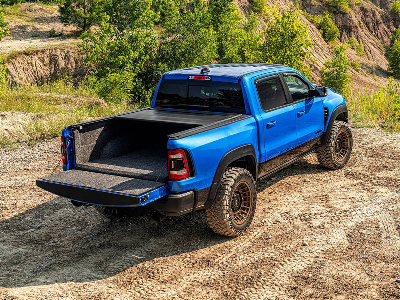 Retrax IX cover about one-third open, tailgate down, outdoors