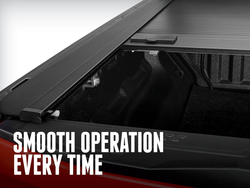 Cover part-open showing rail, end cap and clamp inside the bed, SMOOTH OPERATION EVERY TIME caption
