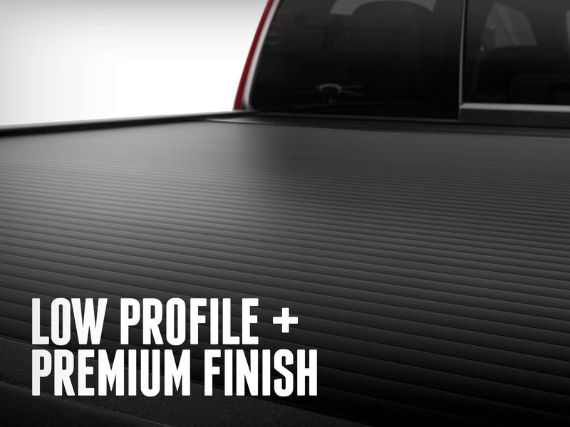 Low-angle close-up of the matte black closed slat surface, LOW PROFILE + PREMIUM FINISH caption