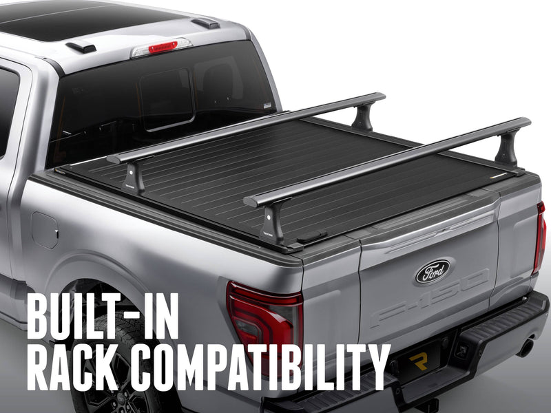 Closed cover with two crossbars on the T-slot rails, overlay Built-In Rack Compatibility (rack sold separately)