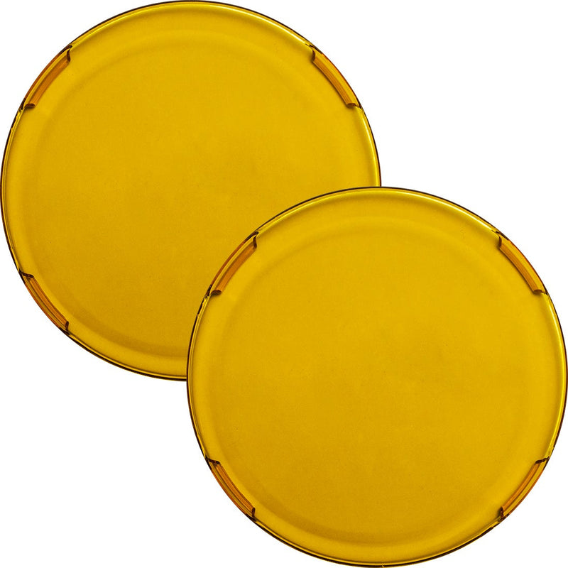 Rigid 360-Series 6" Cover Pair on a studio background: A pair of translucent yellow round 6" light covers overlapped on white