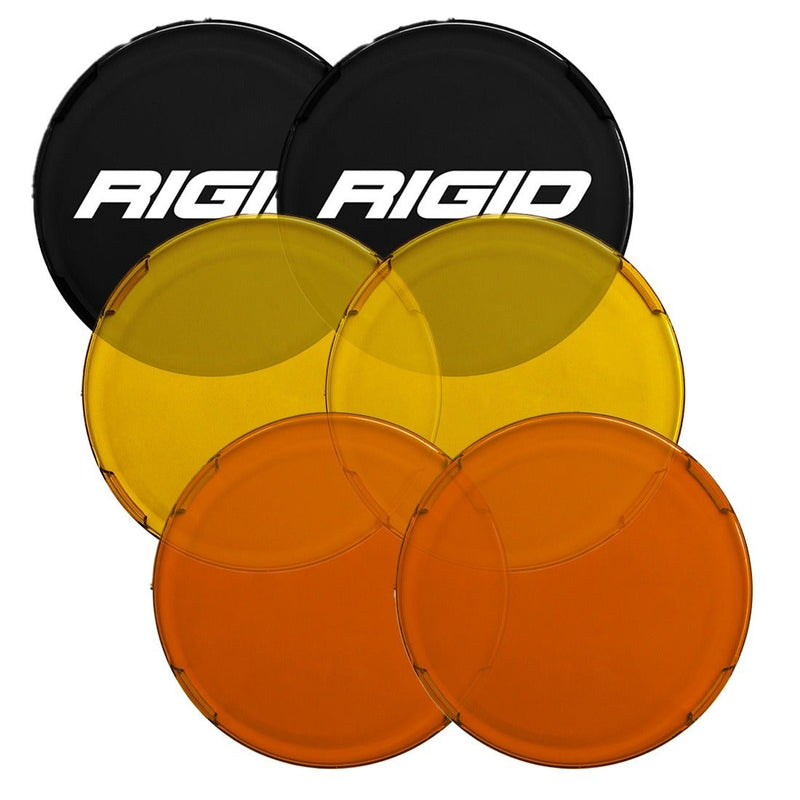 Rigid 360-Series 6" Cover Pair on a studio background: three pairs of round 6" covers in black with Rigid logo, translucent yellow and translucent amber, overlapped on white