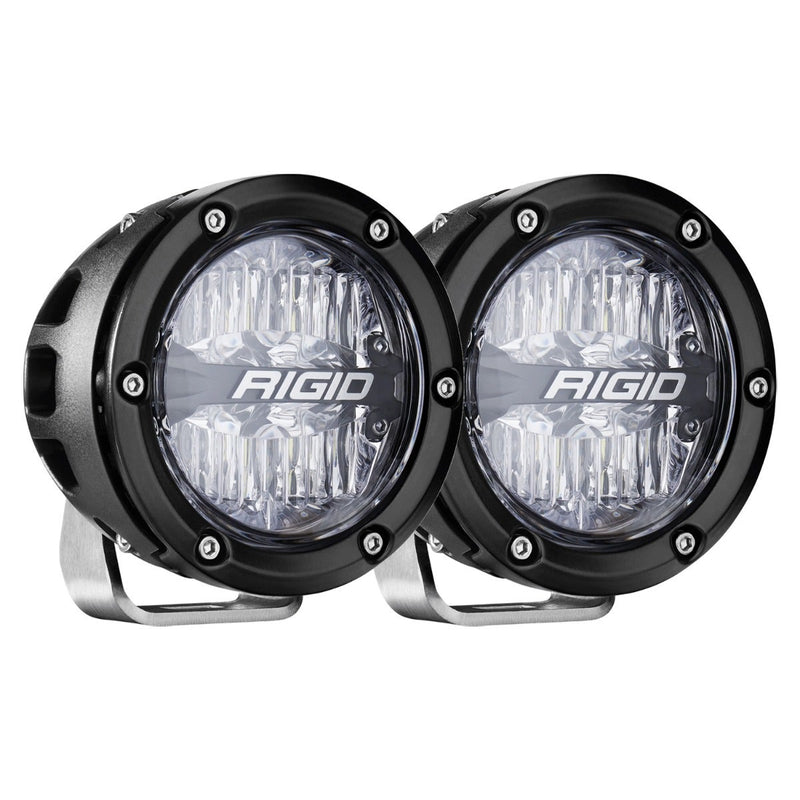 Rigid 360-Series PRO 4" Pair on a studio background: pair of black round 360-Series PRO lights with clear lenses and Rigid lens badge on silver stands, on white