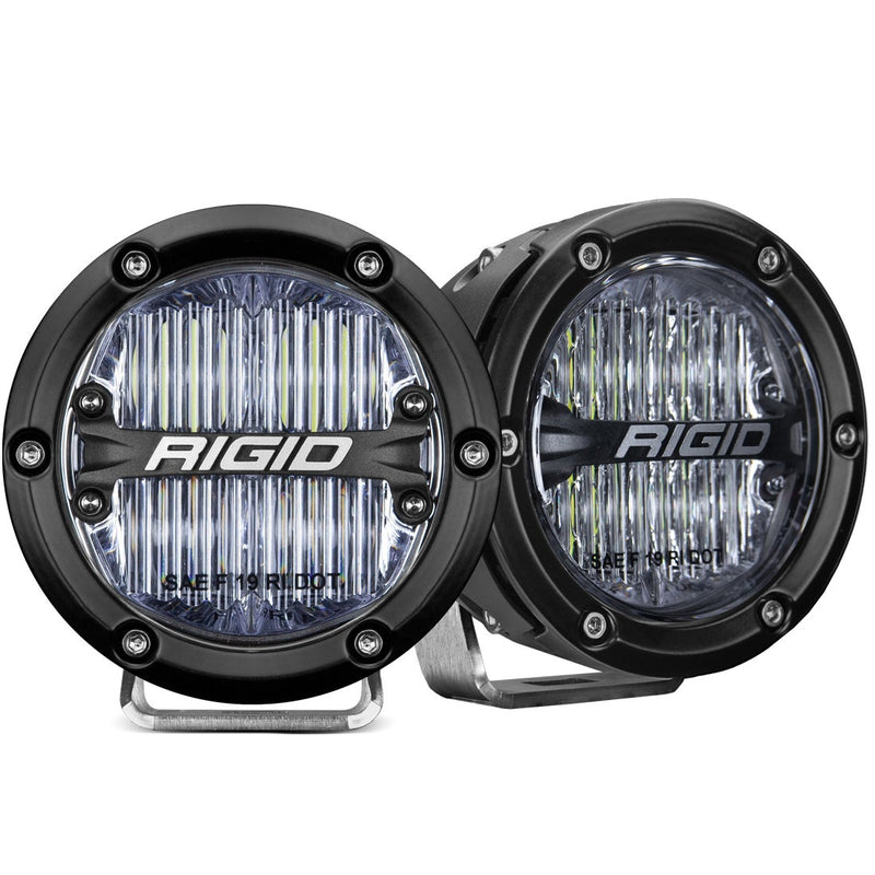Rigid 360-Series PRO 4" SAE Pair on a studio background: A pair of black 4" round SAE fog lights with clear lenses on polished brackets against white