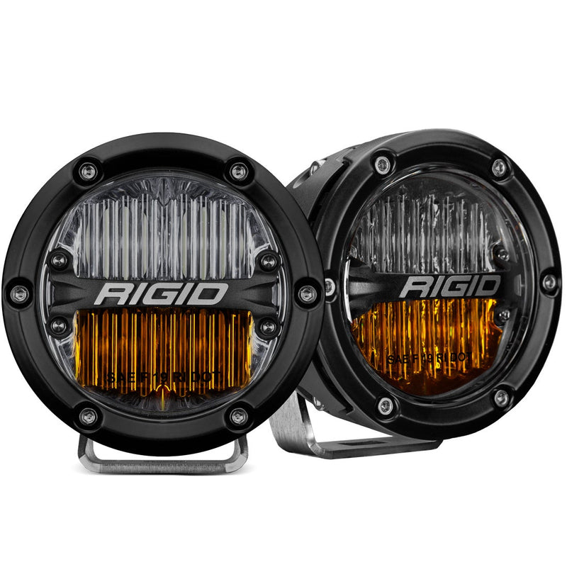 Rigid 360-Series PRO 4" SAE Pair on a studio background: A pair of black 4" round SAE lights with a clear upper and yellow lower lens on polished brackets