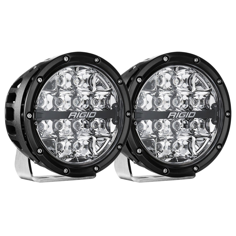 Rigid 360-Series PRO 6" Pair on a studio background: A pair of black 6" round LED lights with clear spot optics on polished brackets against white
