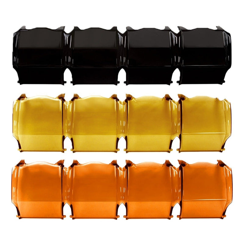 Rigid Adapt 10" Cover, kit contents laid out: black, yellow and amber four-segment light bar covers stacked in three rows
