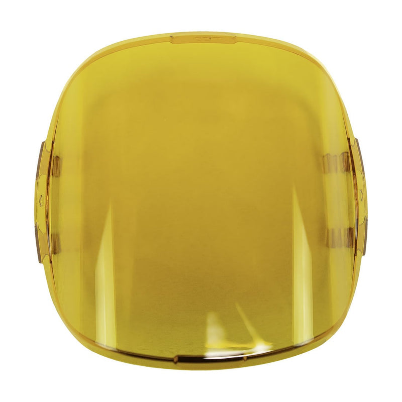 Rigid Adapt XP Cover on a studio background: translucent yellow snap-on lens cover with a rounded square shape on white