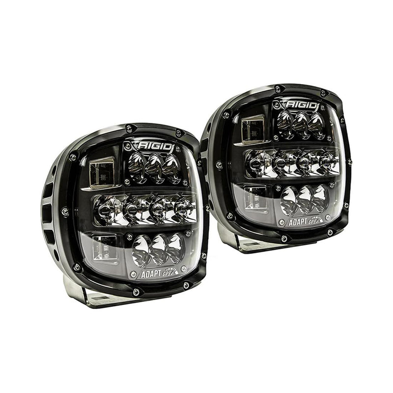 Rigid Adapt XP Pair on a studio background: A pair of black Adapt XP LED lights with clear lenses and finned housings, angled on a white background