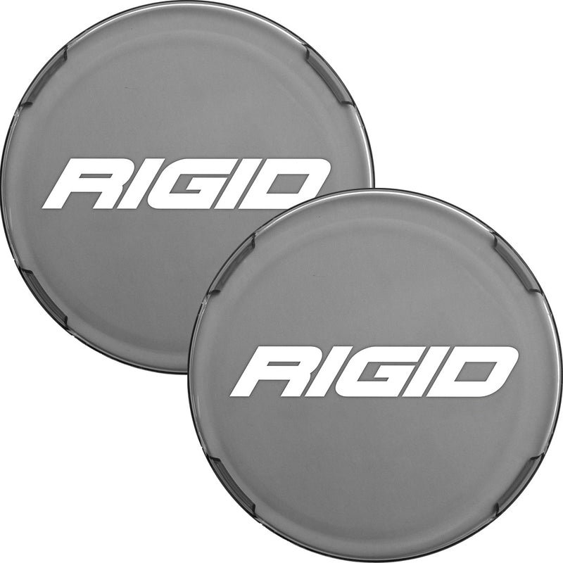 Rigid Industries 360-Series 6" Smoke Cover Pair: two smoke gray round covers printed with the Rigid logo, overlapped on white