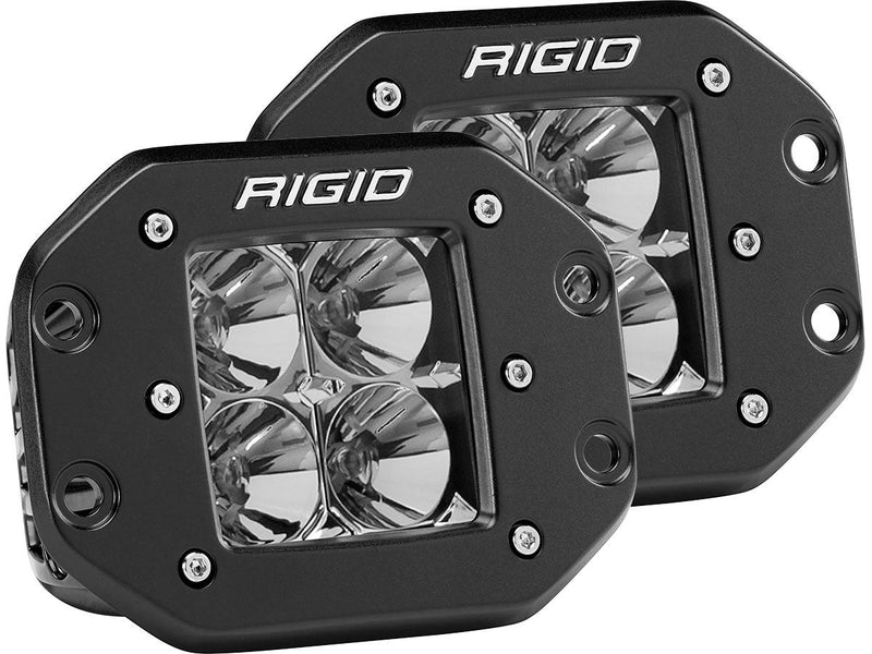 Rigid D-Series PRO Flush Mount Pair on a studio background: A pair of black Rigid D-Series PRO flush mount lights with four clear reflector optics on a white background