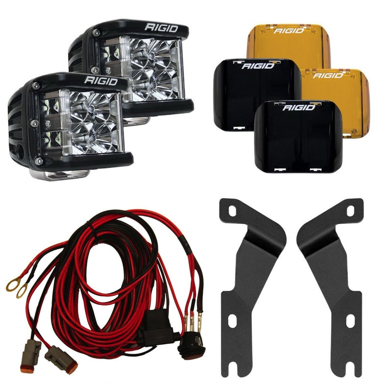 Rigid D-SS Flood A-Pillar Light Kit, kit contents laid out: two Rigid D-SS pods, amber and black covers, a red wiring harness and two A-pillar brackets are laid out on white