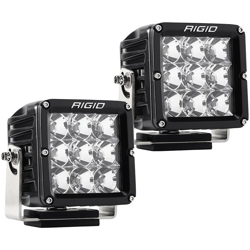 Rigid D-XL PRO Pods Pair on a studio background: A pair of black D-XL PRO flood pods with clear lenses and surface mount brackets on a white background