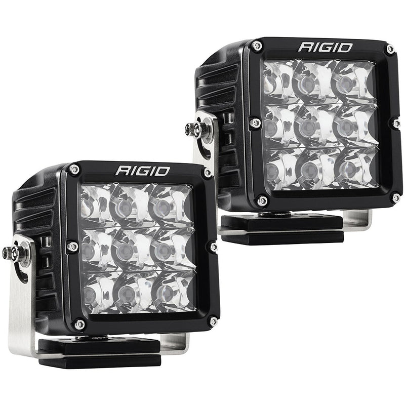 Rigid D-XL PRO Pods Pair on a studio background: A pair of black D-XL PRO spot pods with clear lenses and surface mount brackets on a white background