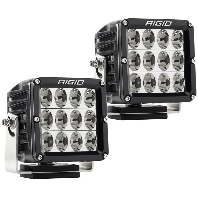 Rigid D-XL PRO Pods Pair on a studio background: A pair of black D-XL PRO pods with clear flood optics and surface mount brackets on a white background