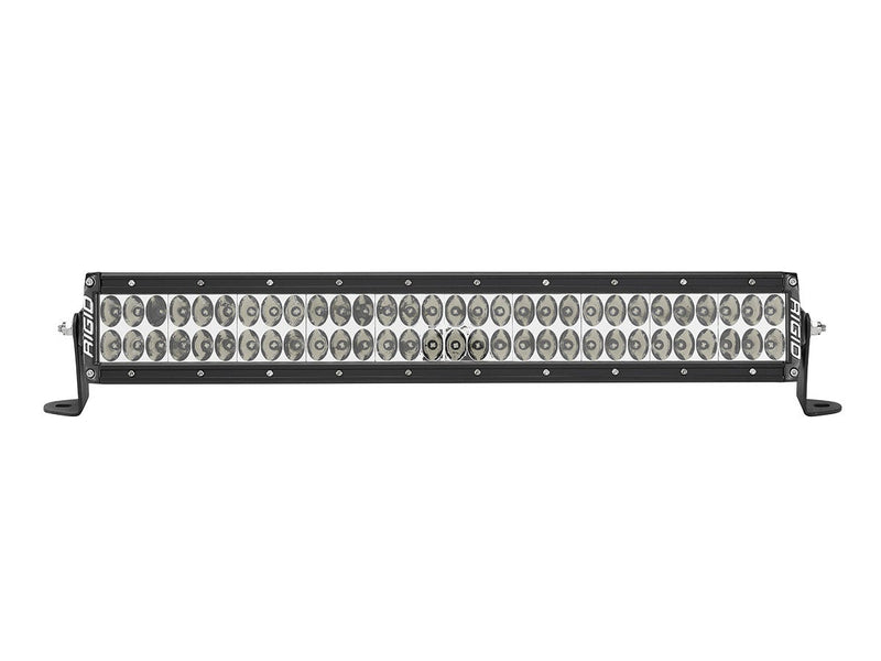Rigid E-Series PRO 20" on a studio background: black 20" dual-row E-Series PRO LED light bar with clear lenses and dense small-reflector optics on end-mount brackets against white