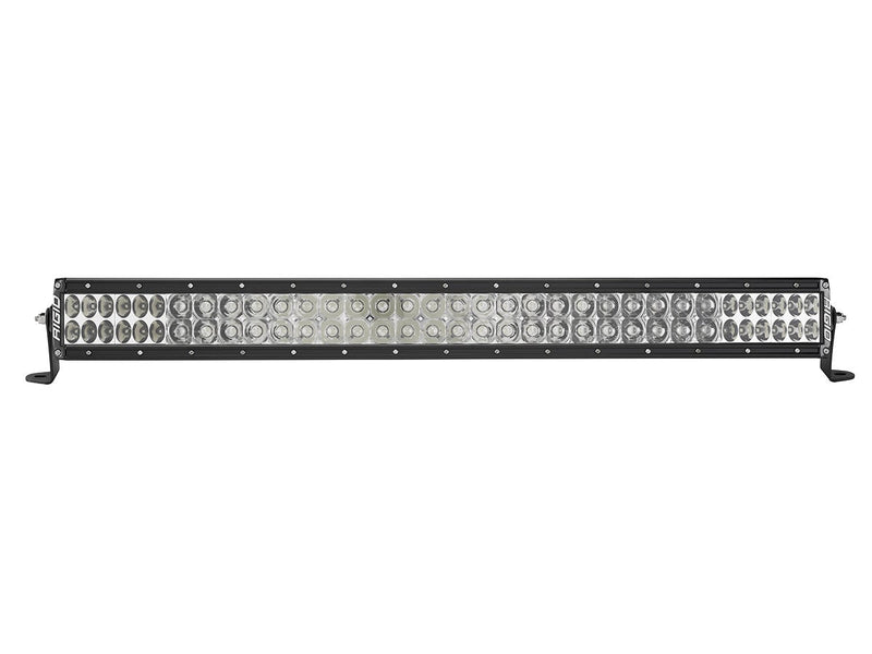 Rigid E-Series PRO 30" on a studio background: black 30" dual-row E-Series PRO LED light bar with clear lenses and combo optics on end-mount brackets against white
