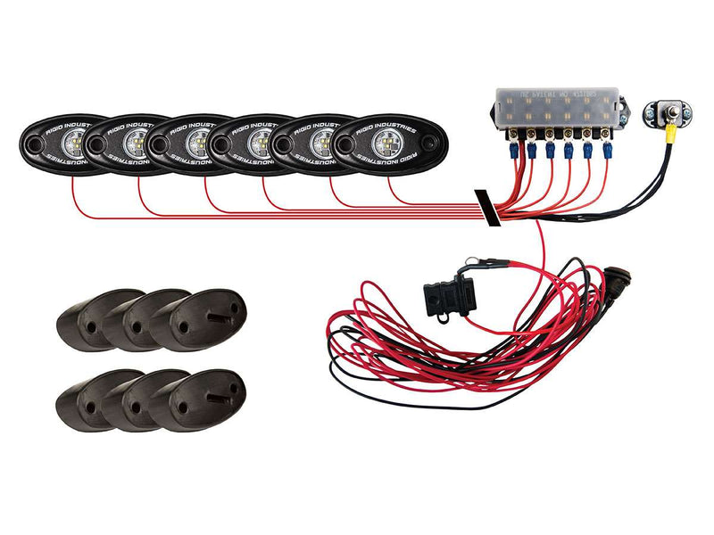 Rigid A-Series Rock Light Kit 6 contents: six lights, control module and wiring harness on white