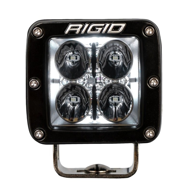 Rigid Radiance+ Pod RGBW Pair on a studio background: front view of a single black Radiance+ pod with four reflector optics, a white backlight and a stainless mounting bracket