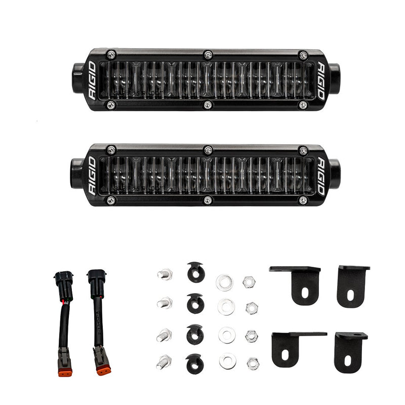 Rigid SAE Fog Light Kit, kit contents laid out: kit layout of two clear-lens LED fog light bars with wiring adapters, hardware and four brackets on white
