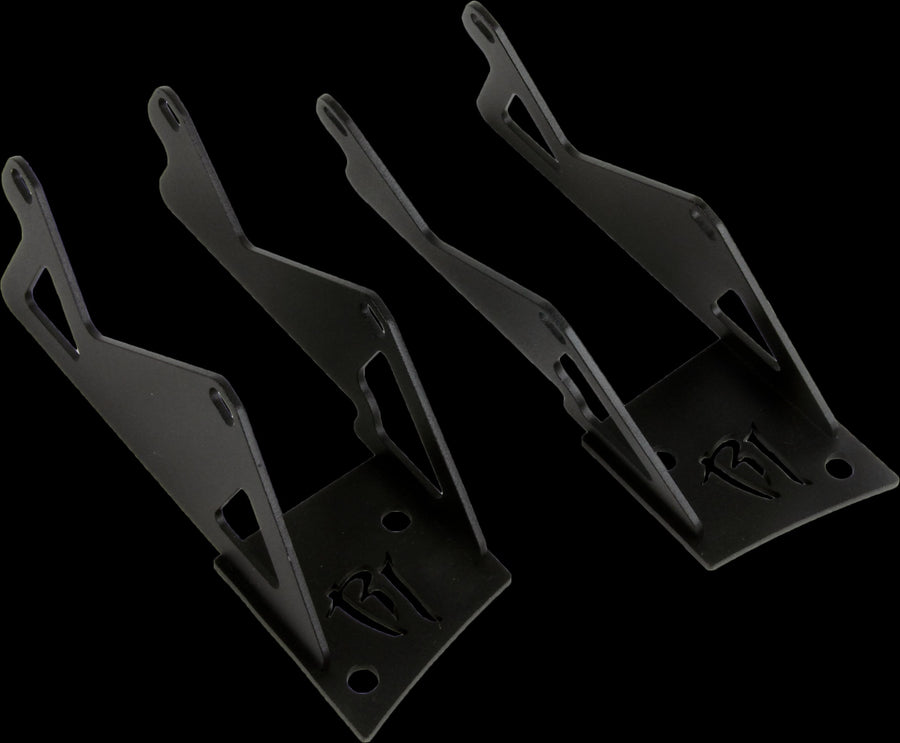 Vehicle-Specific Mounts & Brackets by Rigid: Two tall black dual-pod A-pillar brackets are shown against a black background.