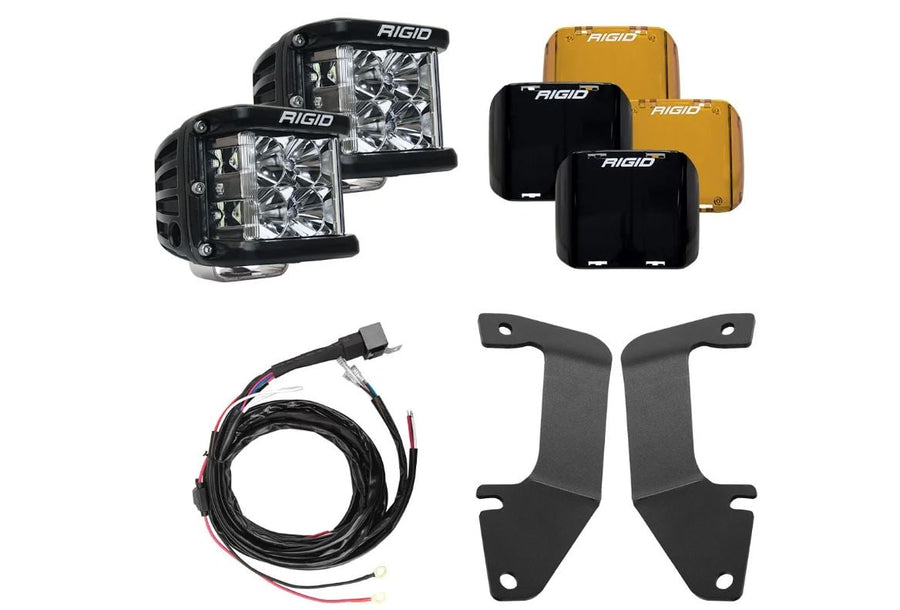 Vehicle-Specific Light Kits by Rigid: A Rigid D-SS A-pillar kit with two pods, covers, harness and brackets is laid out on white.