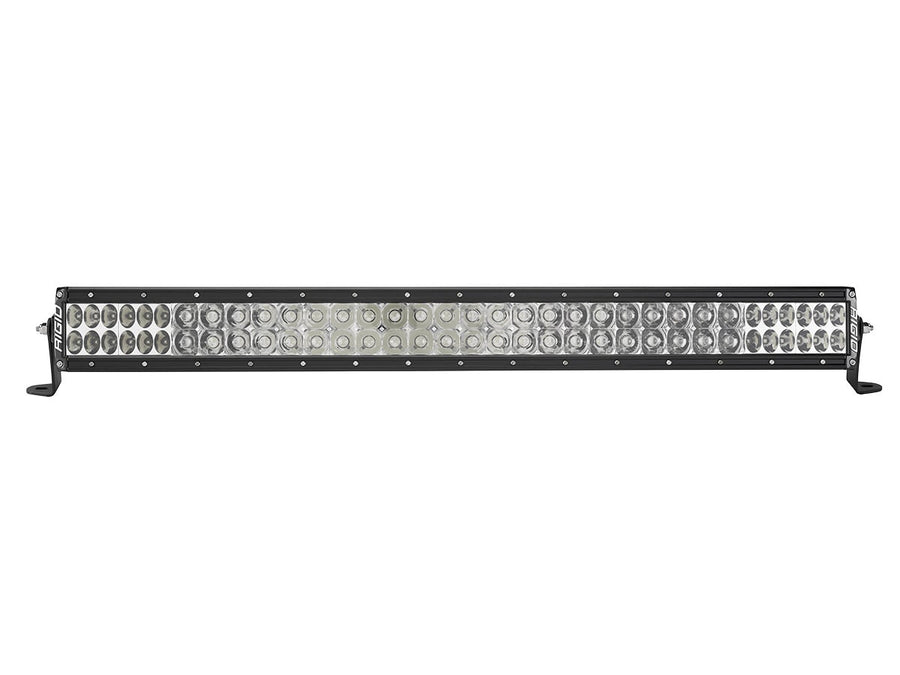 E-Series PRO Light Bars by Rigid: Black 30 inch dual-row E-Series PRO LED light bar with clear lenses and combo optics on end-mount brackets against white.