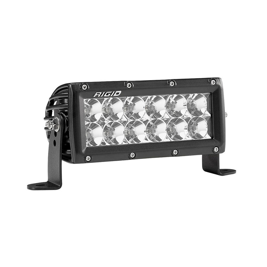 E-Series PRO Light Bars by Rigid: Black 6 inch E-Series PRO LED light with twelve spot reflectors on side brackets against white.