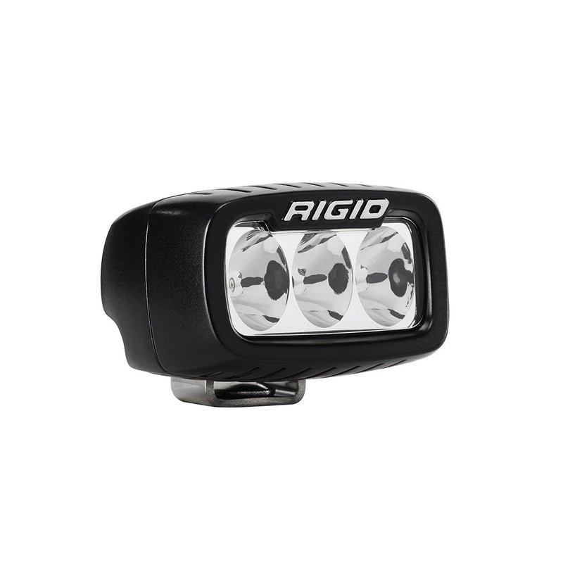 Rigid SR-M Series PRO Driving Pod on a studio background: A black SR-M surface mount pod with a clear three-optic lens on a white background