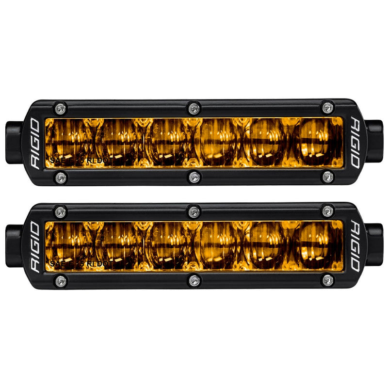 Rigid SR-Series 6" SAE Fog Lights Selective Yellow Pair, kit contents laid out: pair of black 6" SR-Series fog lights with selective yellow lenses, front view on white