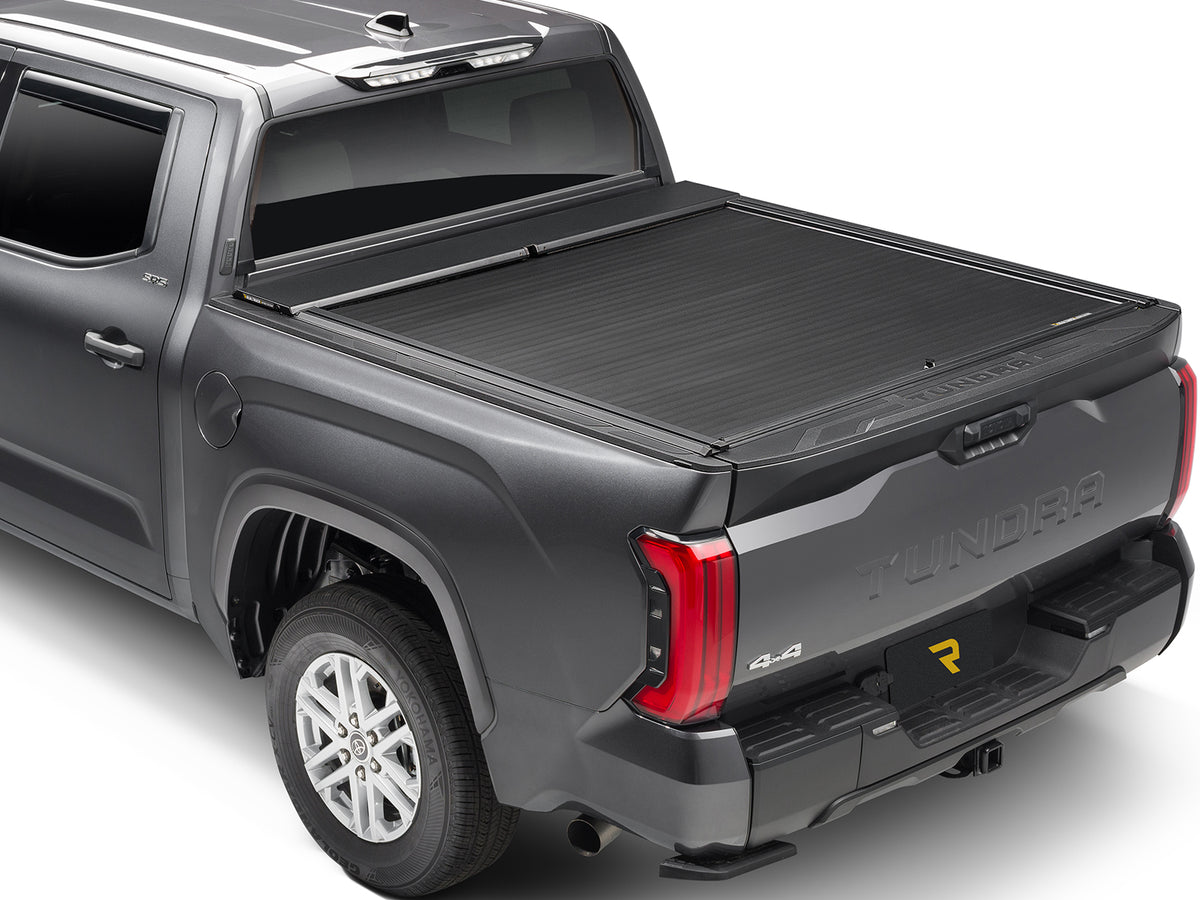 Roll-N-Lock A-Series XT closed over the bed, rear three-quarter view with the tailgate up