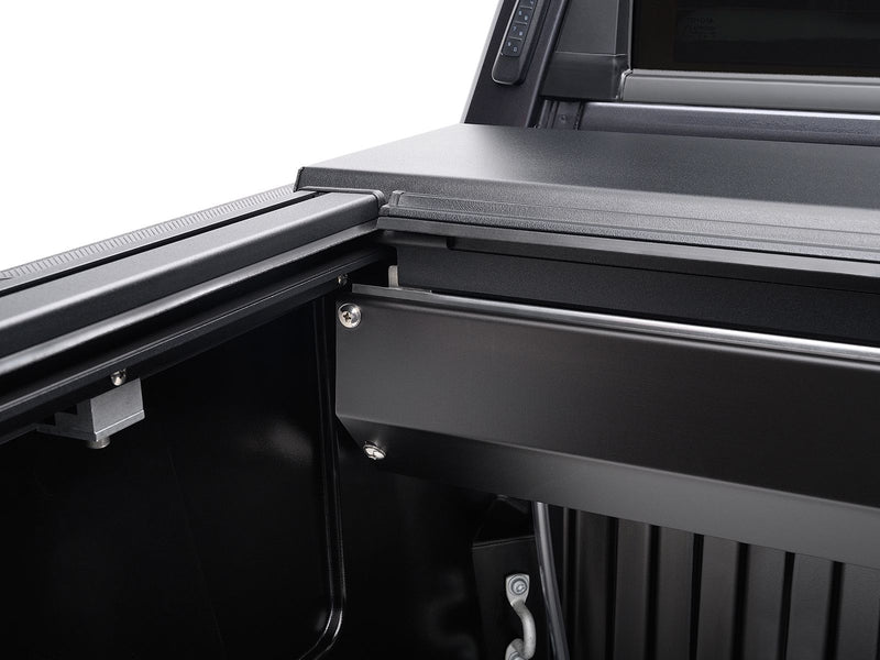 Looking along the open Roll-N-Lock A-Series XT into the bed, canister and rail visible